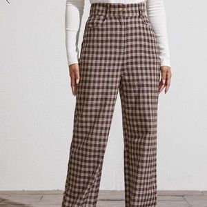 Brown plaid pants with wide leg and pink necklace